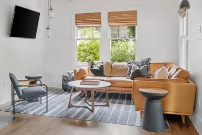 Image de Modern Park Circle Craftsman Cottage with Putting Green & Pool Table
