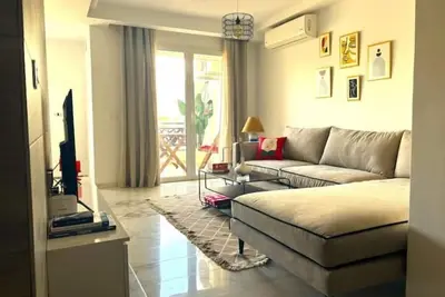 Image de Appartement a 10 min de l aéroport entre les berges du lac et Ain zaghouene,