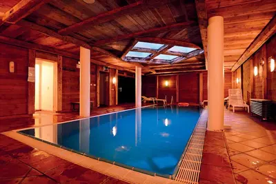 Mountain apartment with the amenities of a hotel and views of the Dolomites