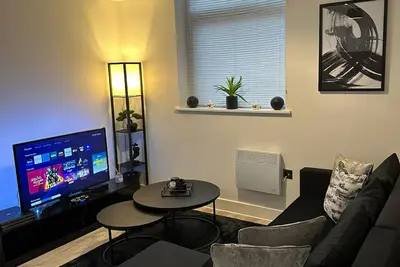 Image de Elegant Urban Retreat: Ideal for Families, Couples, and Solo Adventurers.