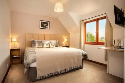 Image de En-suite bedroom with the option of a Super-King or Twin bed.