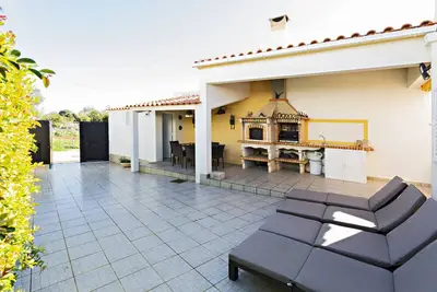 Image de Confortable, avec jardin et espace barbecue