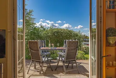 Image de Haus Sonnenschein - Dachterrasse, Schleiblick, Terrasse Garten, Kamin, Dusche