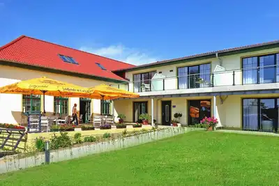 Image de Aparthotel au bord du Heidensee avec bateaux
