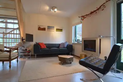 Image de Maison de vacances א Heeten avec jardin