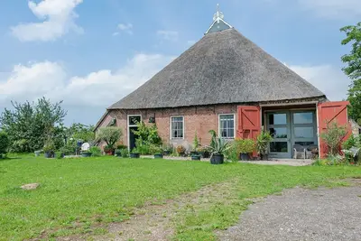 Image de Ferme près de Lauwers avec bateau