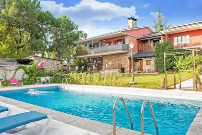 Image de Appartement rural avec jardin commun et piscine