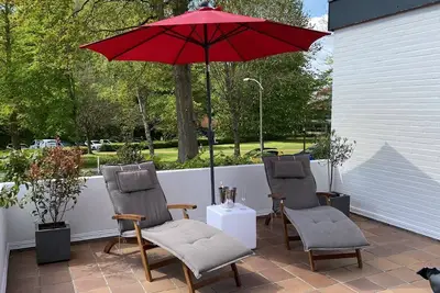 Image de Maison de vacances 'Ferienwohnung Strandgut' avec terrasse privée et Wi-Fi