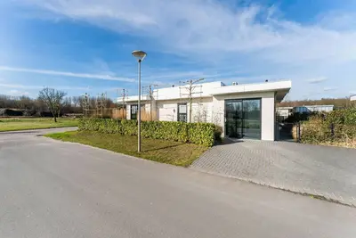Image de Maison de vacances de Zeewolde avec un sauna