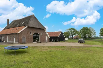 Image de Maison frontale confortable Ă Voorst avec un grand jardin