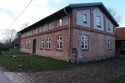 Image de Appartement près de la Baltique avec Cheminée