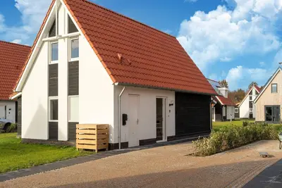 Image de Maison de vacances א Scherpenisse avec jardin