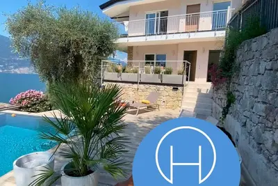 Image de Villa Holzi: Modern apartment with Infinity pool and stunning lakeview