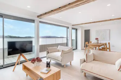 Image de Indulge in seaside luxury at this immaculate first and second floor apartment.