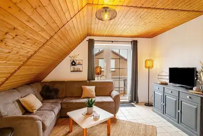 Image de Hübsche Ferienwohnung in Nessmersiel, mit Balkon, Wlan, Haustiere Gestattet. wallbox