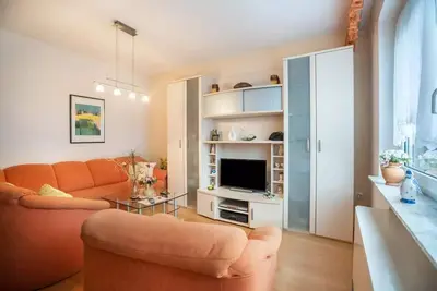 Image de The vacation apartment Niedl App Helene 1 is located in Neßmersiel and offers everything you need for a relaxing vacation.