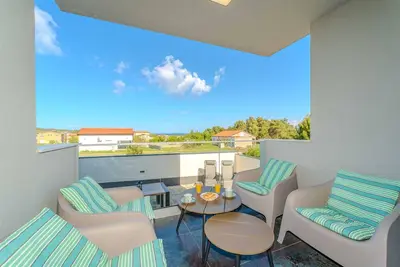 Image de Partial sea view | for 4 persons | New and modern apartment