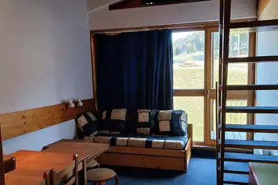 Image de Appartement 2 pièces 7 personnes en duplex, au pied des pistes et des commerces, proche de l'Esf et de la garderie dans le villa