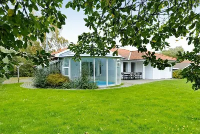 Image de Maison de vacances pour 8 a Juelsminde-By Traum