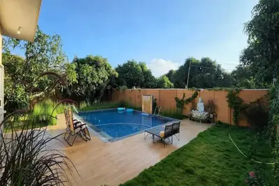 Image de Farm with modern 3 Bhk pool villa providing green retreat for urban dwellers.
