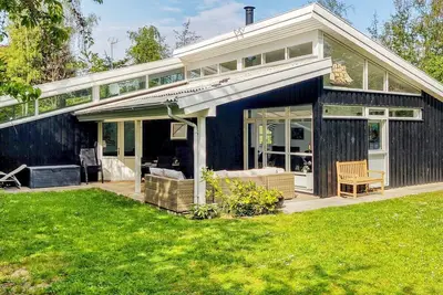 Image de Maison de vacances pour 8 a Græsted-By Traum