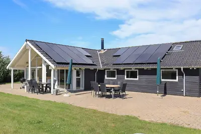 Image de Maison de vacances pour 12 a Løkken-By Traum