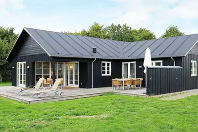 Image de Maison de vacances pour 8 a Nysted-By Traum