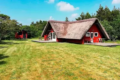 Image de Cottage paisible avec chaume a Romo-By Traum
