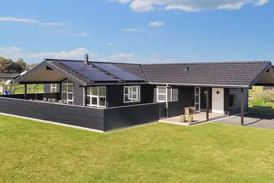 Image de Maison de vacances pour 10 a Løkken