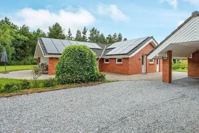 Image de Maison de vacances pour 8 a Oksbøl-By Traum