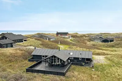 Image de Maison de vacances pour 10 a Løkken-By Traum