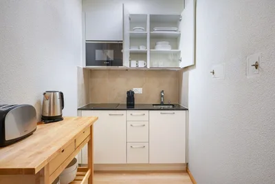 Image de Phenomenal Wiedikon Studio w\/ Shared W\/D, 2 Min to Market, by Blueground