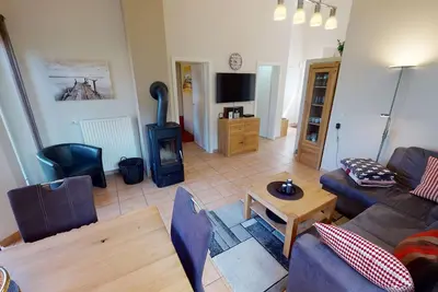 Image de Gemütliches Ferienhaus für 4 Personen mit Sauna, Kamin und E-auto-ladestation