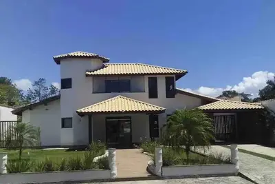 Image de Casa em Cond. fechado em Peruibe, 4 Suites, Piscina