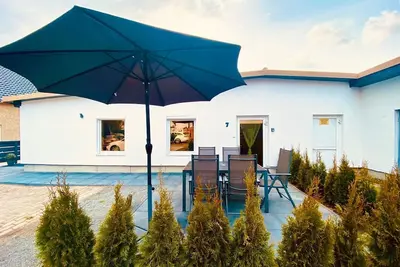 Image de Käpten Karl Ferienhaus - Käpten Karl Ferienhaus mit Sauna 400m zum Strand - Familienfreundlich