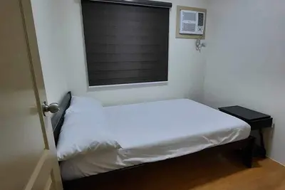 Image de Cozy two-bedroom condo fully equipped for a comfortable stay wt fam or friends. \n