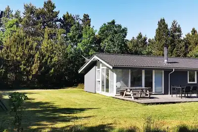 Image de Charmantes Ferienhaus nur 100 m vom Kinderfreundlichen Sandstrand