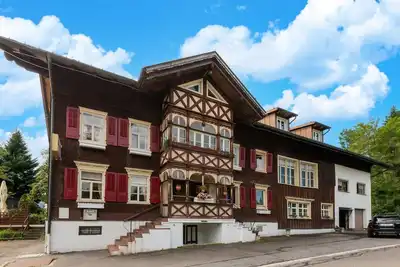Image de Appartement confortable à Sibratsgfäll avec jardin