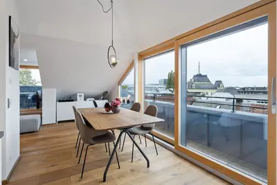 Image de A dreamy city apartment with a view of Lake Constance.