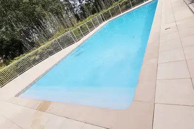 Image de Appart 2 chambres piscine jardin