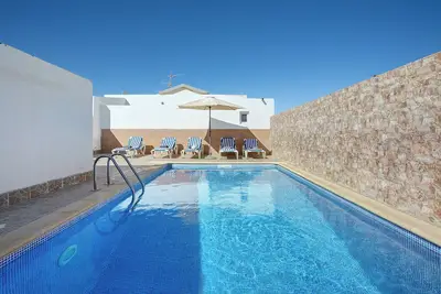 Image de Appartement de vacances 'Casa Tomás C' avec vue sur la mer, piscine partagée et Wi-Fi