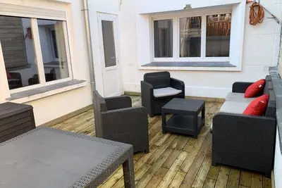 Image de Appartement Rez-de-chaussée avec courette - Plage à 1 minute à pieds