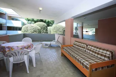 Image de Appartement 'Appartamento Solar Con Piscina' avec piscine partagée et terrasse privée
