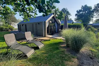 Gemütliches Holland-beachhouse 40m² mit Garten, Blick Aufs Wasser im Ferienpark