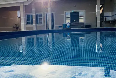 Image de Casa de Praia com Piscina e Churrasqueira Indaiá - Bertioga