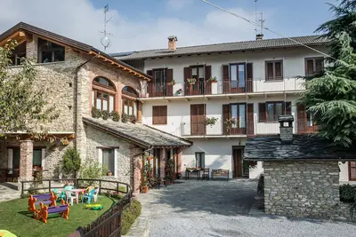 Image de Appartement 'Locanda Ca Bianca - Family Suite' avec vue sur la montagne, jardin partagé et Wi-Fi