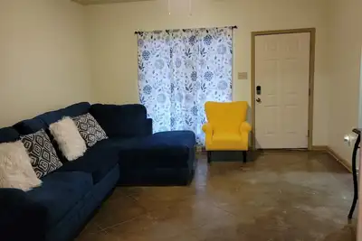 Image de Unit A- A charming 3-bedroom, 2-bathroom duplex offering a cozy atmosphere.