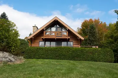 Image de Cozy Chalet-all in Wood-fireplace-ski-tube Sliding-28 Acres