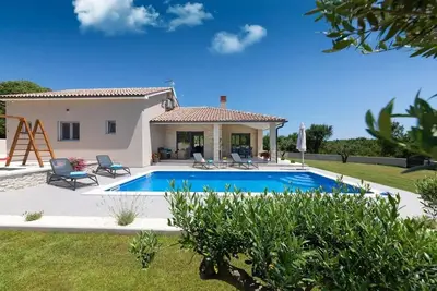 Image de Maison de vacances Belavići pour 1 - 6 personnes avec 2 chambres à coucher - Maison de vacances