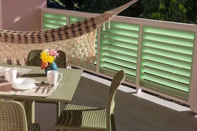 Image de The beach, golf, everything close to our breezy, quiet, comfortable apartments.